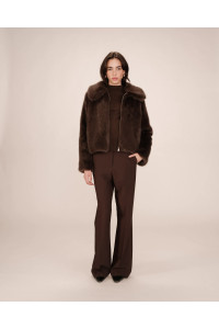 Manteau court en fausse fourrure