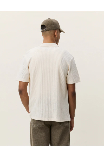 Chemise en tricot ajouré