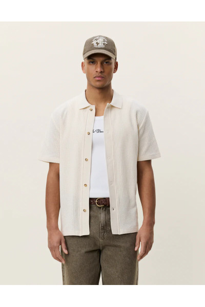 Chemise en tricot ajouré